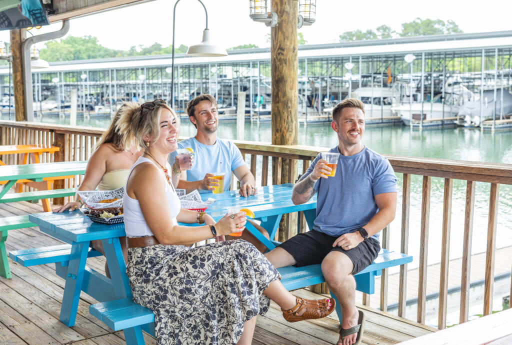 a group of friends enjoying their visit at Calhouns on the river in Lenior City, TN